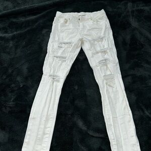 White amiri skinny jeans